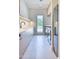Modern laundry room featuring stainless steel appliances, sleek cabinets, and a sink at 6215 N Casa Blanca Dr, Paradise Valley, AZ 85253