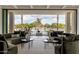 Spacious living room boasts comfortable seating and seamless indoor-outdoor flow to the pool area at 6215 N Casa Blanca Dr, Paradise Valley, AZ 85253