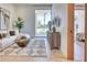 Comfortable living room showcasing a modern aesthetic with natural light and access to the backyard at 6215 N Casa Blanca Dr, Paradise Valley, AZ 85253
