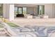 Inviting patio with comfortable seating and a view of the pool and outdoor living area at 6215 N Casa Blanca Dr, Paradise Valley, AZ 85253