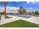 Large backyard pool with lounge chairs and an outdoor kitchen, perfect for relaxation and entertainment at 6215 N Casa Blanca Dr, Paradise Valley, AZ 85253
