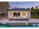 Stylish poolside lounge area with comfortable seating, perfect for relaxation and entertaining guests at 6215 N Casa Blanca Dr, Paradise Valley, AZ 85253