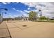 Well-maintained tennis court with professional lighting and surrounding landscaping, enhancing recreational amenities at 6215 N Casa Blanca Dr, Paradise Valley, AZ 85253
