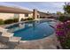 Relaxing kidney-shaped pool with flagstone patio at 931 E Eveningstar Ln, Tempe, AZ 85283