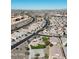 Aerial view of houses and a playground in a residential community at 1241 E Paul Dr, Casa Grande, AZ 85122