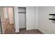Bedroom with a closet and neutral colored carpet at 12461 W Midway Ave, Glendale, AZ 85307