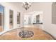 Open dining room with views into the living room and kitchen at 18654 W Solano Dr, Litchfield Park, AZ 85340