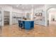 Island kitchen with stainless steel appliances and granite countertops at 18654 W Solano Dr, Litchfield Park, AZ 85340