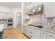 Spacious kitchen with stainless steel range and granite countertops at 18654 W Solano Dr, Litchfield Park, AZ 85340