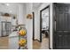 Bright hallway with dark gray doors leading to bedroom at 369 W Glacier Bay Dr, San Tan Valley, AZ 85140