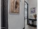 Bright hallway with tile flooring and elegant wall decor at 369 W Glacier Bay Dr, San Tan Valley, AZ 85140
