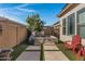 Private backyard hot tub and waterfall feature at 369 W Glacier Bay Dr, San Tan Valley, AZ 85140