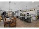 Modern kitchen with white cabinets, granite countertops, and an island at 369 W Glacier Bay Dr, San Tan Valley, AZ 85140