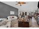 Open living room with hardwood floors, neutral color palette, and modern furniture at 369 W Glacier Bay Dr, San Tan Valley, AZ 85140