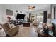 Relaxing living room with comfy sofas and sliding glass doors to patio at 369 W Glacier Bay Dr, San Tan Valley, AZ 85140