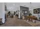 Open floor plan with tile floors and views into the dining area at 369 W Glacier Bay Dr, San Tan Valley, AZ 85140