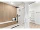 Spa-like bathroom with walk-in shower and marble tile at 6056 E Harvard St, Scottsdale, AZ 85257