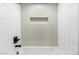 Simple bathroom with shower and new tile at 6056 E Harvard St, Scottsdale, AZ 85257