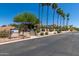 Spanish style community building with stairs and landscaping at 6056 E Harvard St, Scottsdale, AZ 85257