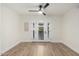 Bright entryway with modern door and wood floors at 6056 E Harvard St, Scottsdale, AZ 85257