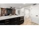 Modern kitchen with island and built-in microwave at 6056 E Harvard St, Scottsdale, AZ 85257