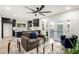 Open concept kitchen and living area with modern appliances at 6056 E Harvard St, Scottsdale, AZ 85257