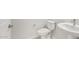 Cozy half-bath featuring a sleek pedestal sink and modern fixtures at 7674 W Cactus Wren Way, Florence, AZ 85132
