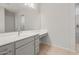 Bathroom featuring a sink, vanity with drawers, and a large mirror at 7736 W Mockingbird Way, Florence, AZ 85132
