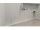 Unfinished laundry room showing plumbing fixtures for a washer and dryer at 7736 W Mockingbird Way, Florence, AZ 85132