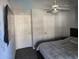 Bright bedroom with double doors and ceiling fan at 1720 E Thunderbird Rd # 2015, Phoenix, AZ 85022