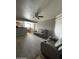 Spacious living room with gray reclining sofas at 1720 E Thunderbird Rd # 2015, Phoenix, AZ 85022