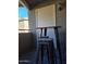 Small patio with table and two stools at 1720 E Thunderbird Rd # 2015, Phoenix, AZ 85022