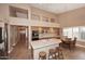 Open kitchen with island, stainless steel appliances, and wood cabinets at 23307 N 71St Dr, Glendale, AZ 85310