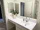 Bathroom featuring single sink, ample counter space, and modern fixtures at 26722 N 174Th Ln, Surprise, AZ 85387