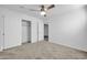 Spacious bedroom with sliding door closet and carpet at 26722 N 174Th Ln, Surprise, AZ 85387