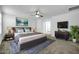 Spacious bedroom featuring modern furniture and a contemporary design at 26722 N 174Th Ln, Surprise, AZ 85387