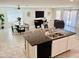 Modern kitchen with a center island, stainless steel appliances, and an open-concept design at 26722 N 174Th Ln, Surprise, AZ 85387