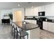 Contemporary kitchen featuring granite countertops, stainless steel appliances, and ample cabinet space at 26722 N 174Th Ln, Surprise, AZ 85387