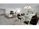 Open-concept living room with a dining area and neutral tones at 26722 N 174Th Ln, Surprise, AZ 85387