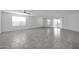 Bright living room featuring tile floors and sliding glass door at 26722 N 174Th Ln, Surprise, AZ 85387