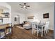 Open concept dining area with white table and chairs at 320 S 70Th St # 36, Mesa, AZ 85208