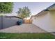 Side yard with gravel driveway and wooden gate at 3436 E Fairmount Ave, Phoenix, AZ 85018