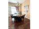 Elegant dining room with hardwood floors and a chandelier at 5431 E Shea Blvd, Scottsdale, AZ 85254
