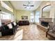 Spacious living room featuring a fireplace and ample natural light at 5431 E Shea Blvd, Scottsdale, AZ 85254