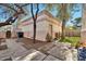 Landscaped backyard with stone pathway and storage building at 6002 N 5Th Pl, Phoenix, AZ 85012