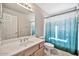 Clean and functional bathroom with a shower/tub combo at 6002 N 5Th Pl, Phoenix, AZ 85012