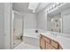 Elegant bathroom with double sinks, a soaking tub, and a shower at 6002 N 5Th Pl, Phoenix, AZ 85012