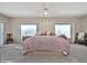 Bright and airy bedroom with ceiling fan and ample natural light at 6002 N 5Th Pl, Phoenix, AZ 85012
