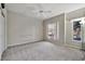 Well-lit bedroom featuring a large window and neutral decor at 6002 N 5Th Pl, Phoenix, AZ 85012