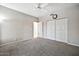 Simple bedroom with ceiling fan and lots of closet space at 6002 N 5Th Pl, Phoenix, AZ 85012